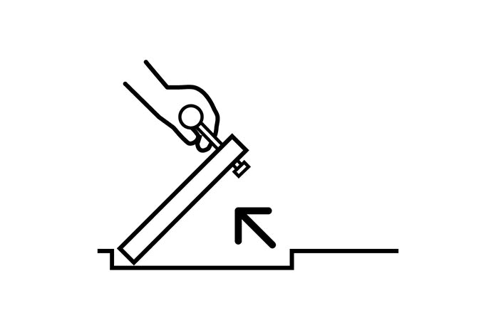 Insert the Safety Key and turn to 90° so it locks onto the back of the lid. Pull the key upwards to lift the lid edge to a 90° position.
