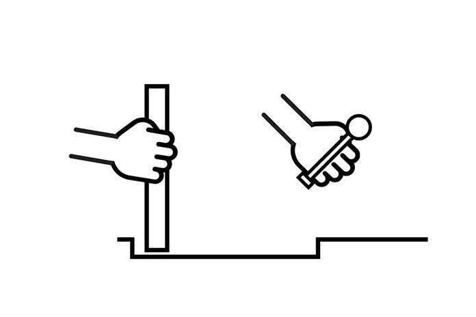 Hold the raised edge of the HIDE lid firmly in one hand. Release the Safety Key and set aside.