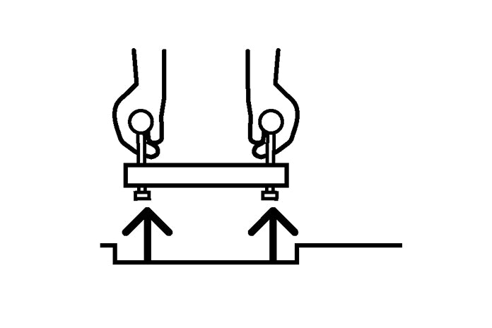 Lift vertically, just enough to clear the recess.