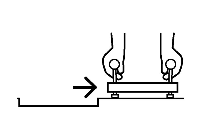 Set safely aside. Do not carry the lid at a height.