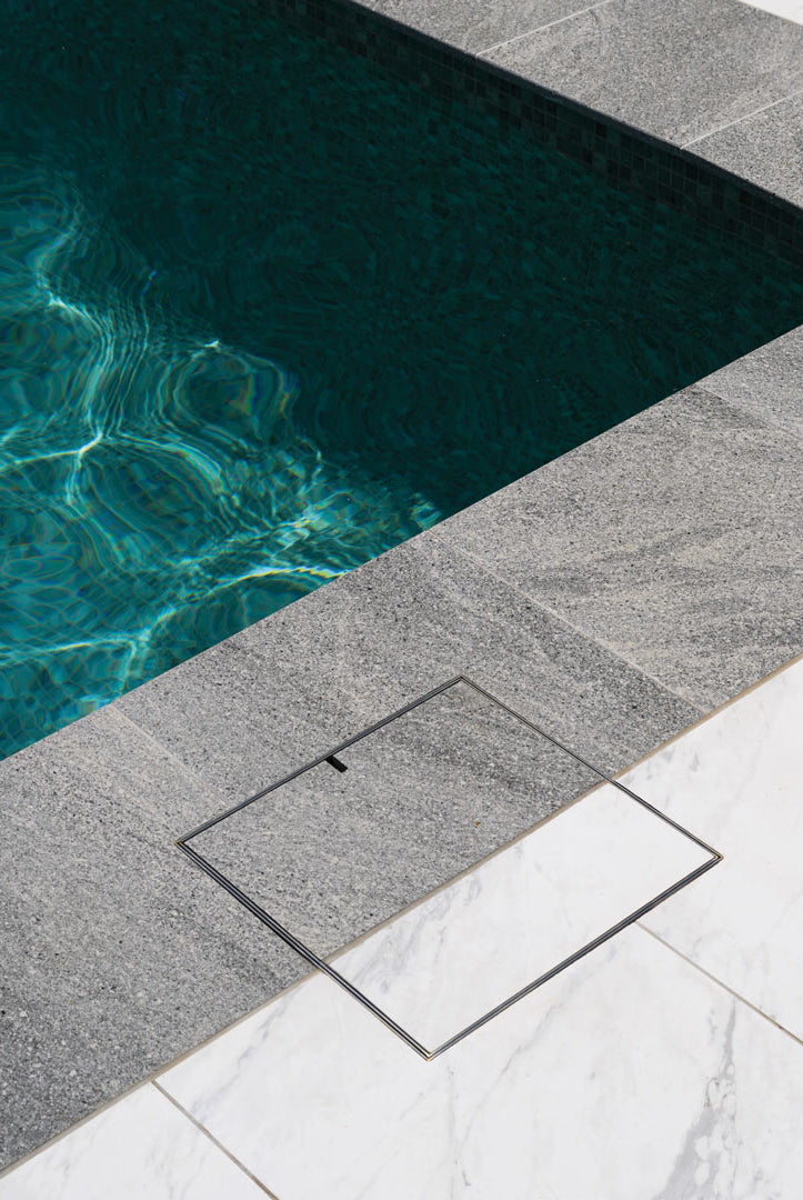 HIDE Skimmer Cover with coping and poolside tile infills to match