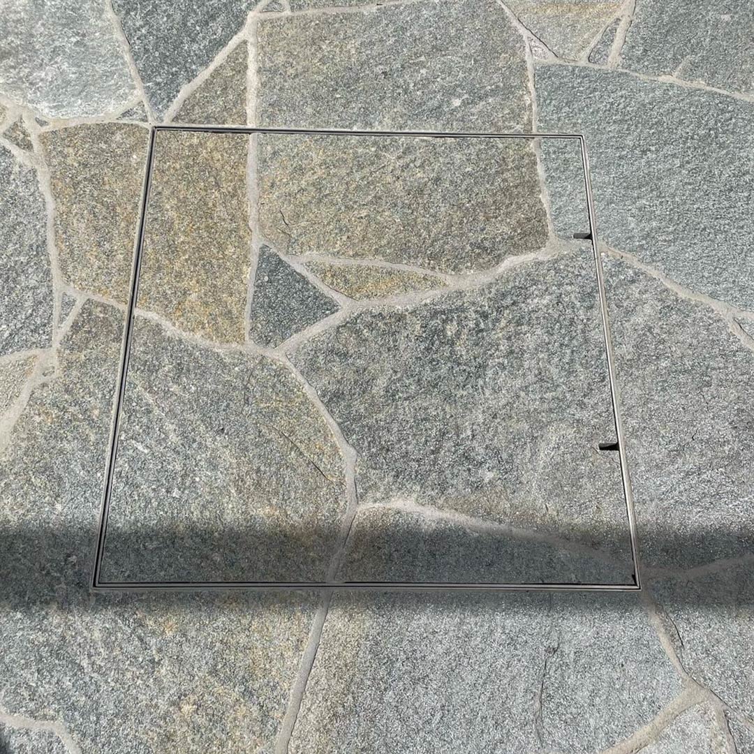 656mm HIDE Access Cover with crazy pave stone inlay.