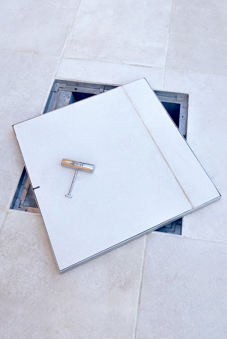 HIDE manhole cover with one key to open it