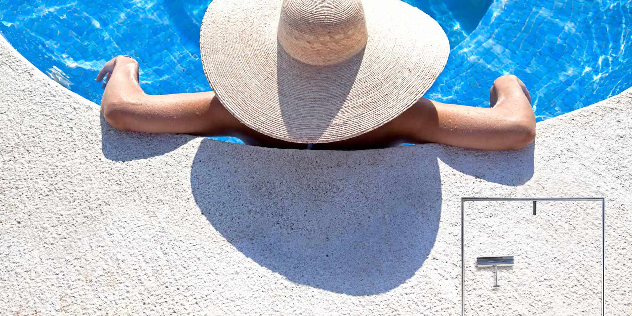 Poolside concrete coping with a discreet flush HIDE stainless steel skimmer cover, shown close-up inset.