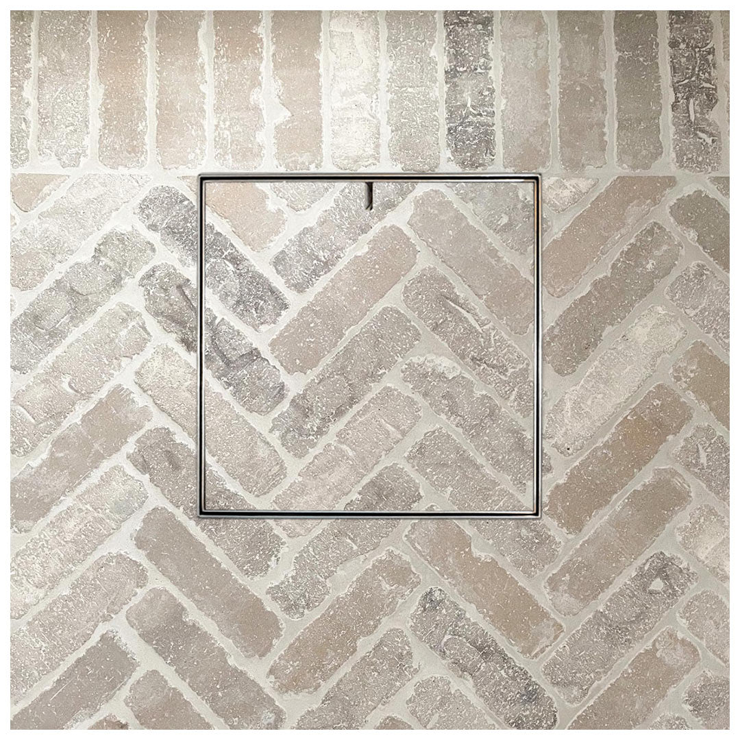 Large 656mm HIDE Drain Cover with herringbone pattern inlay.
