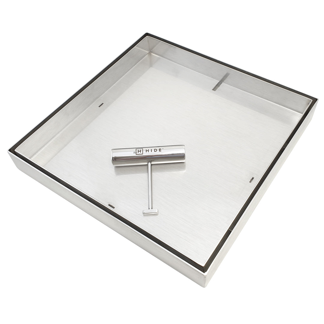 HIDE drain cover hardware showing frame, inlay tray and one safety key