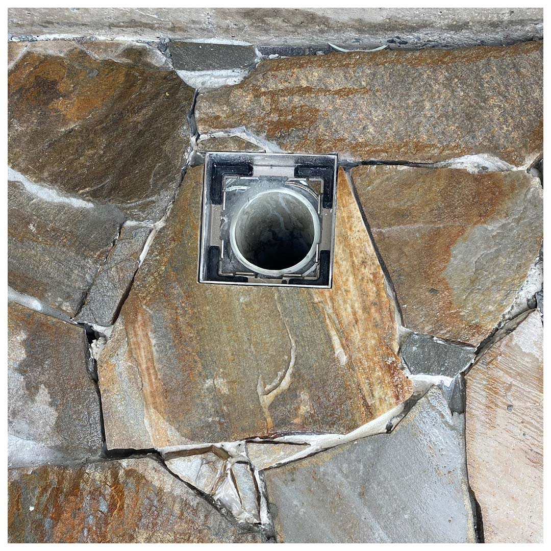 HIDE Drain recess frame showing open drainage pipe.
