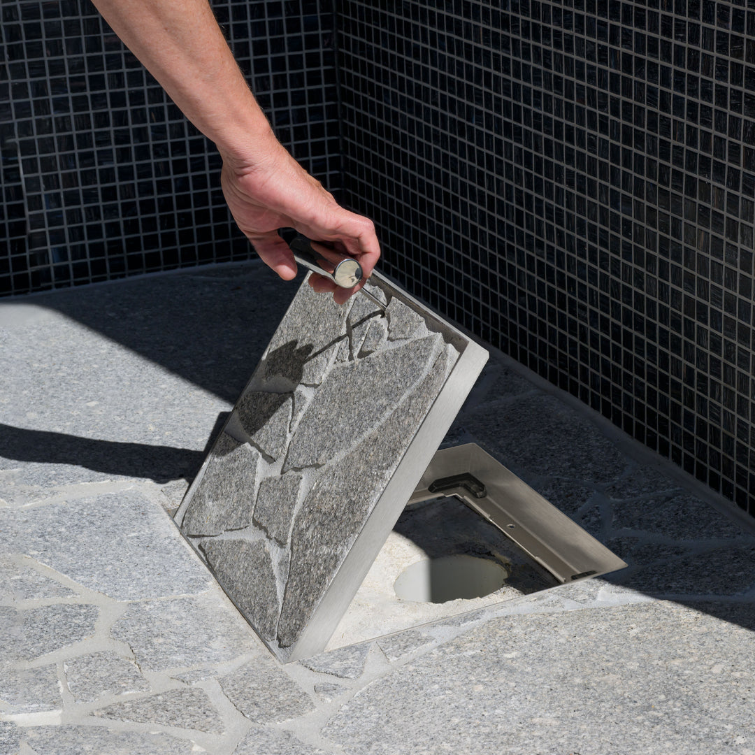 HIDE Drain Cover being opened with key