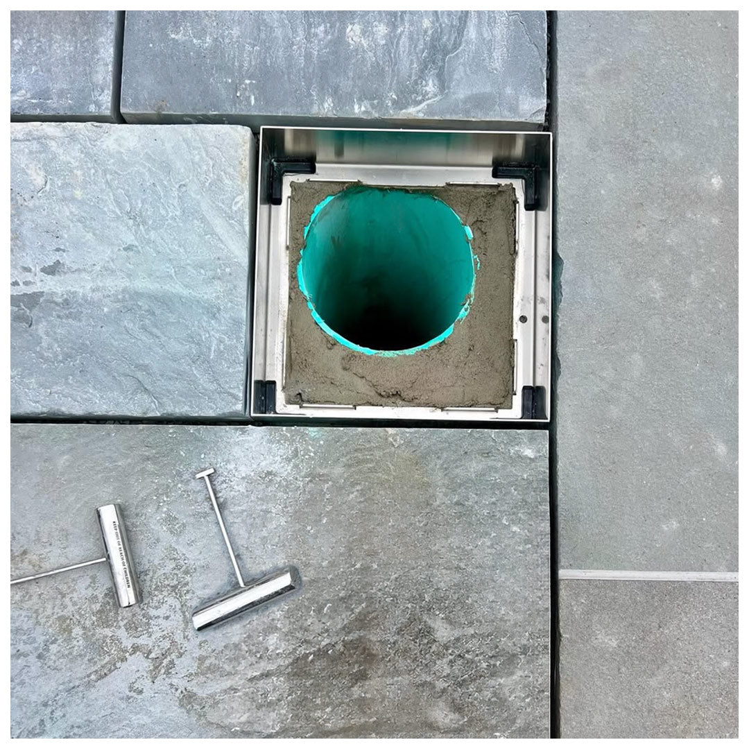 HIDE Access Cover with frame over an access inspection point. Showing that a HIDE Cover doesn't have to be centred over an inspection point.