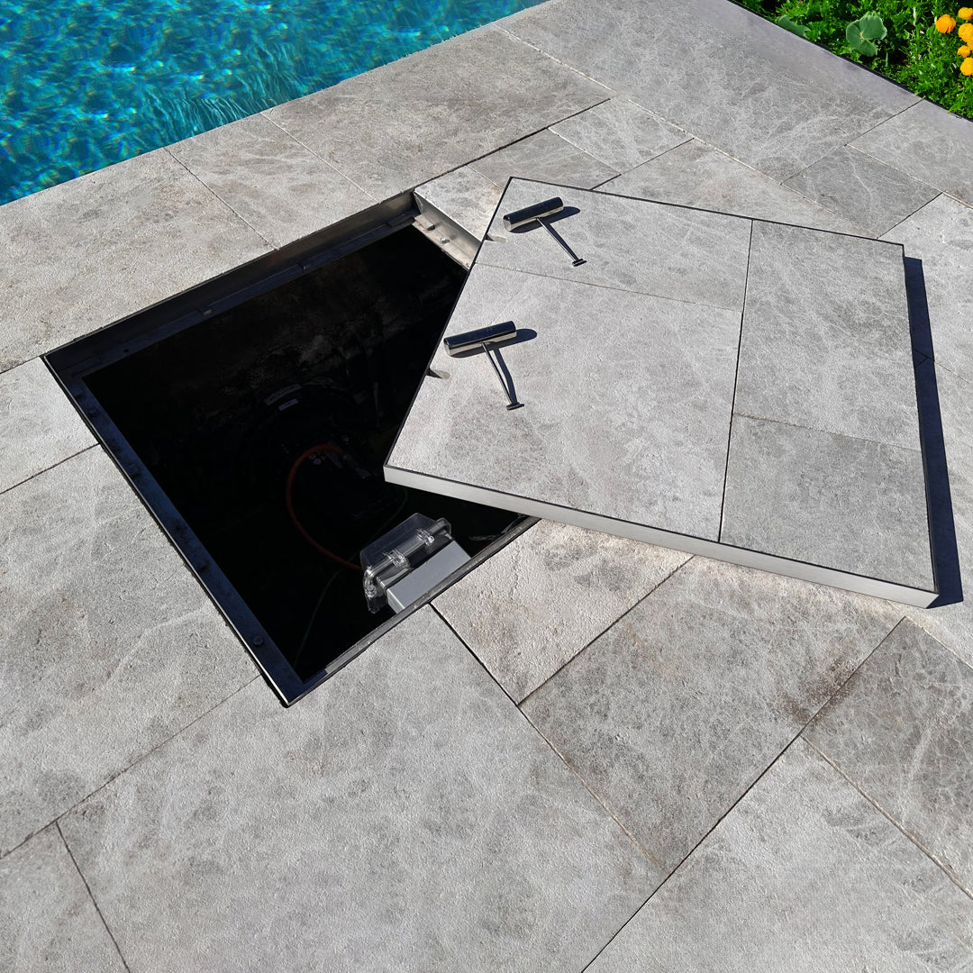 HIDE manhole cover with 2 keys to open it